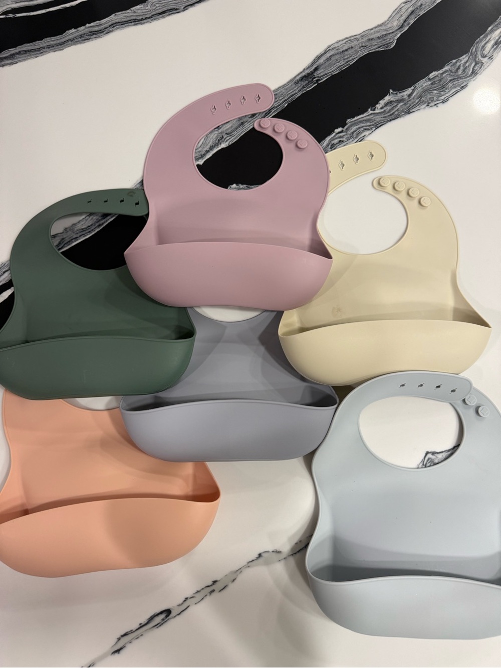Mushie Adjustable Silicone Baby Bib Set in Pink, Green, Cream, Gray, Peach, Blue